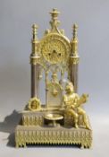 An early 19th century French silvered and gilt metal architectural 8 day mantel clock cast with a