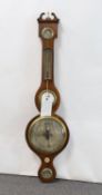A George III rosewood wheel barometer and thermometer, with engraved silvered dials marked G.