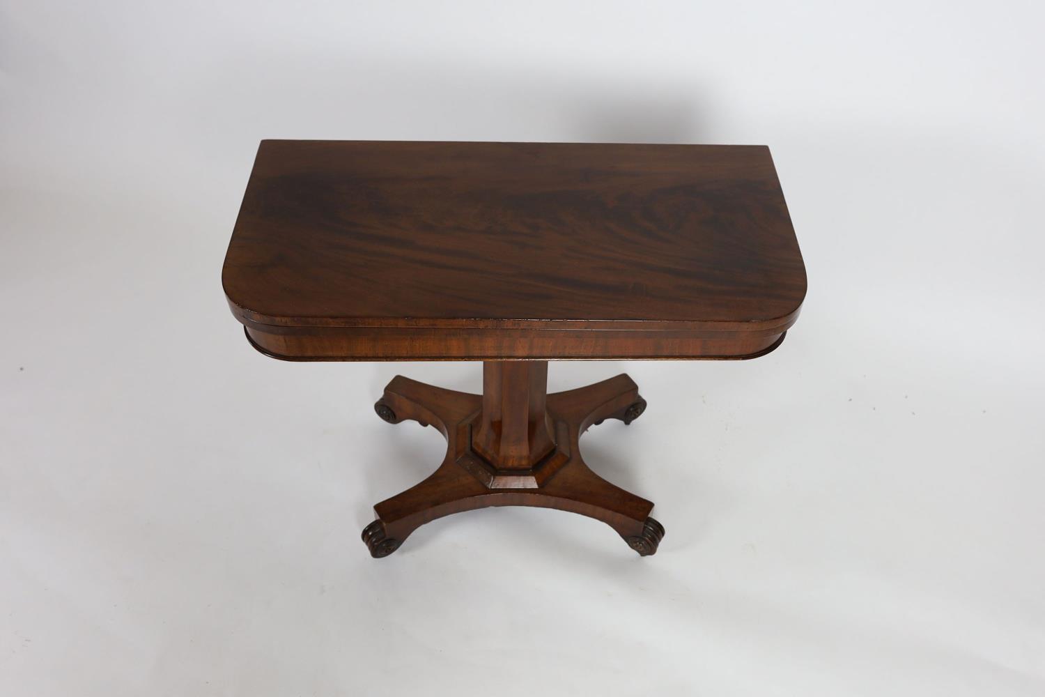 An early Victorian rectangular mahogany folding card table, on octagonal column, width 90cm depth - Image 2 of 3