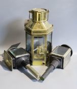 A Victorian brass carriage lamp, with turned wood handle, height 41cm, together with two other