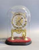 A 19th century brass skeleton mantel timepiece, under glass dome, with single fusee movement and