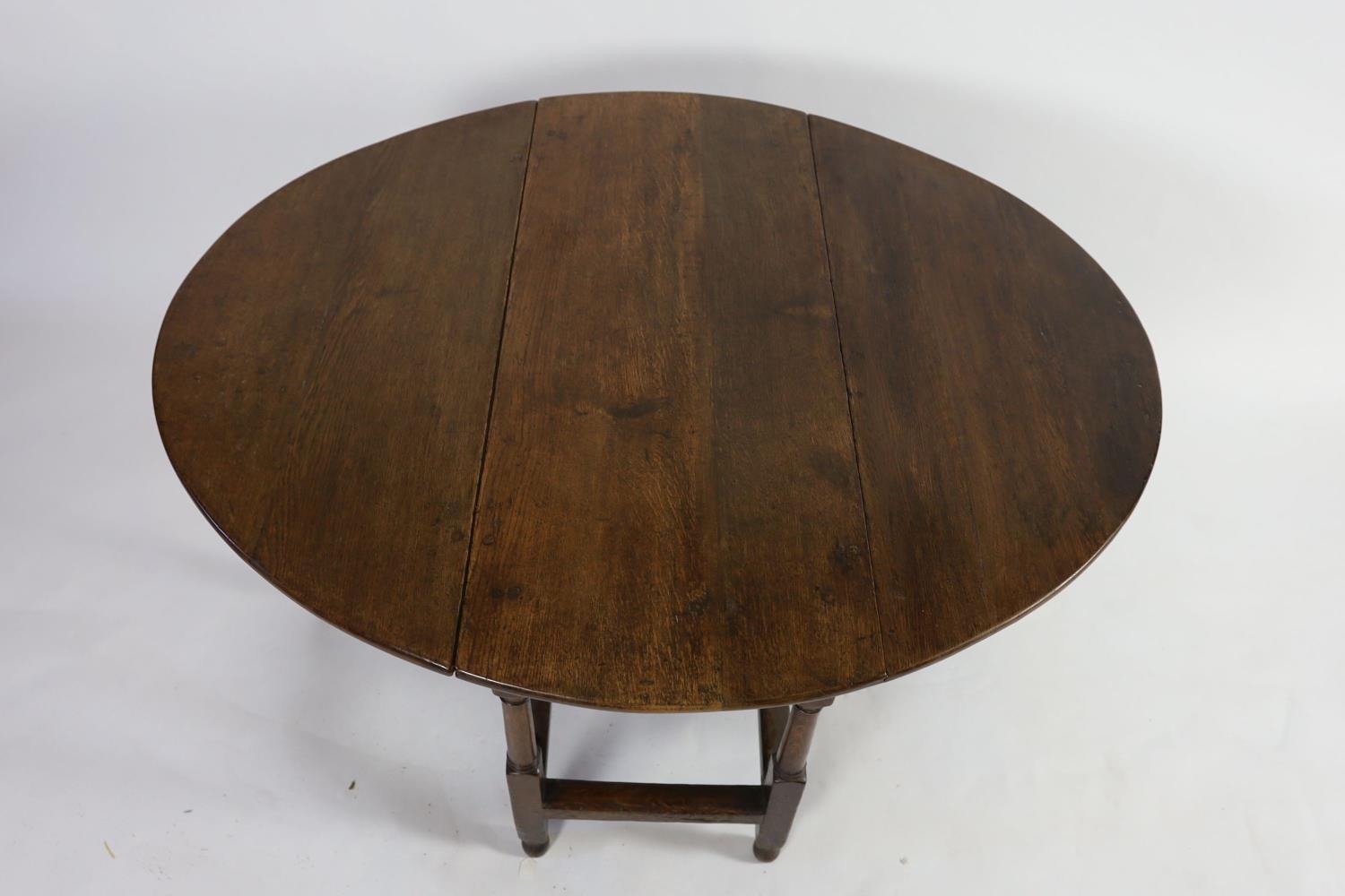 An 18th century oak gateleg dining table, 140cm extended, width 51cm height 75cm - Image 3 of 3