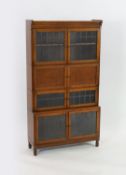 An early 20th century Globe Wernicke style four section bookcase, with leaded glazed doors, width