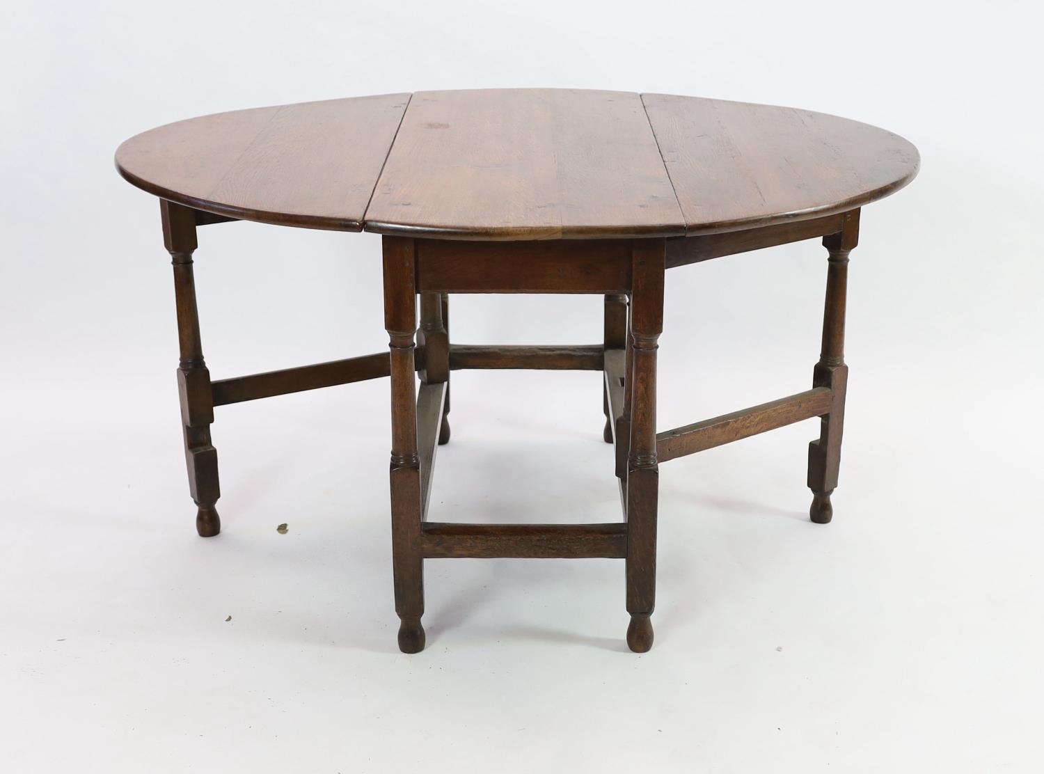 An 18th century oak gateleg dining table, 140cm extended, width 51cm height 75cm - Image 2 of 3