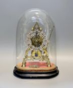 A 19th century brass skeleton mantel timepiece, under glass dome, with single fusee movement and