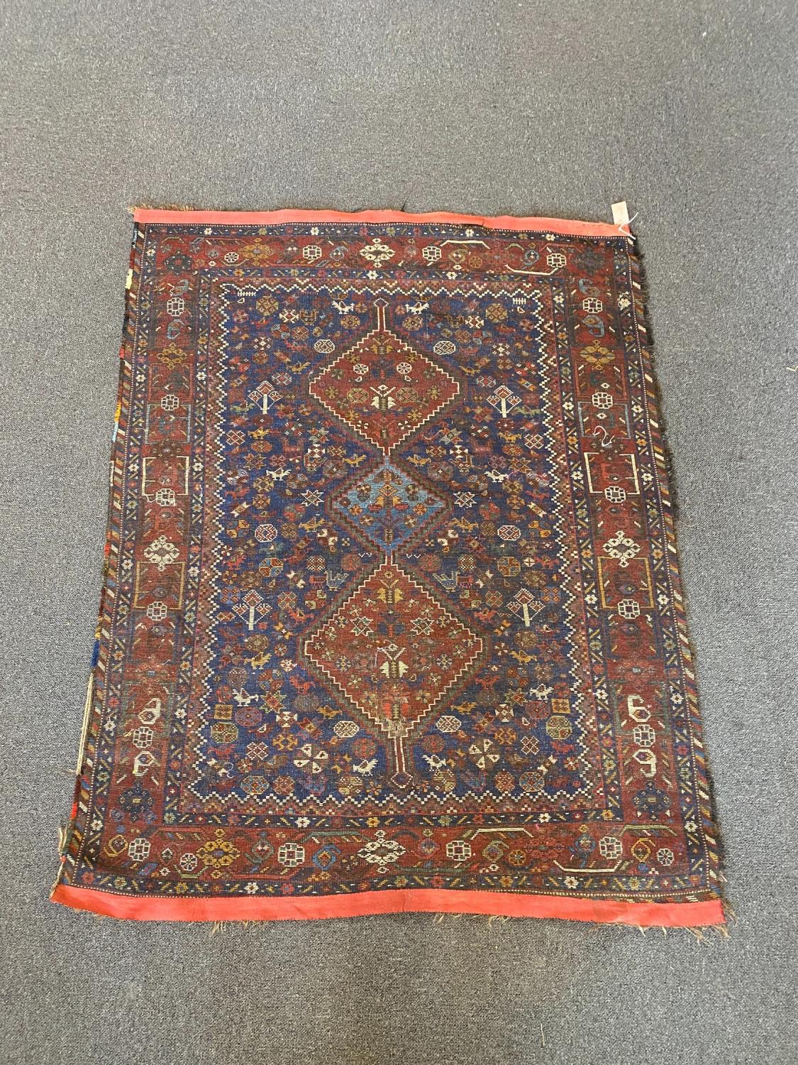 A Shiraz blue ground rug with triple lozenge medallion and floral border 160 x 122 cms. - Image 4 of 4