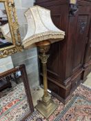 A late Victorian lacquered brass corinthian column oil lamp standard, converted to electricity,