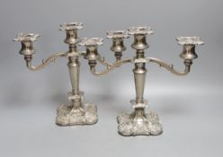 A pair of two branch, three light plated candelabra - 26cm high