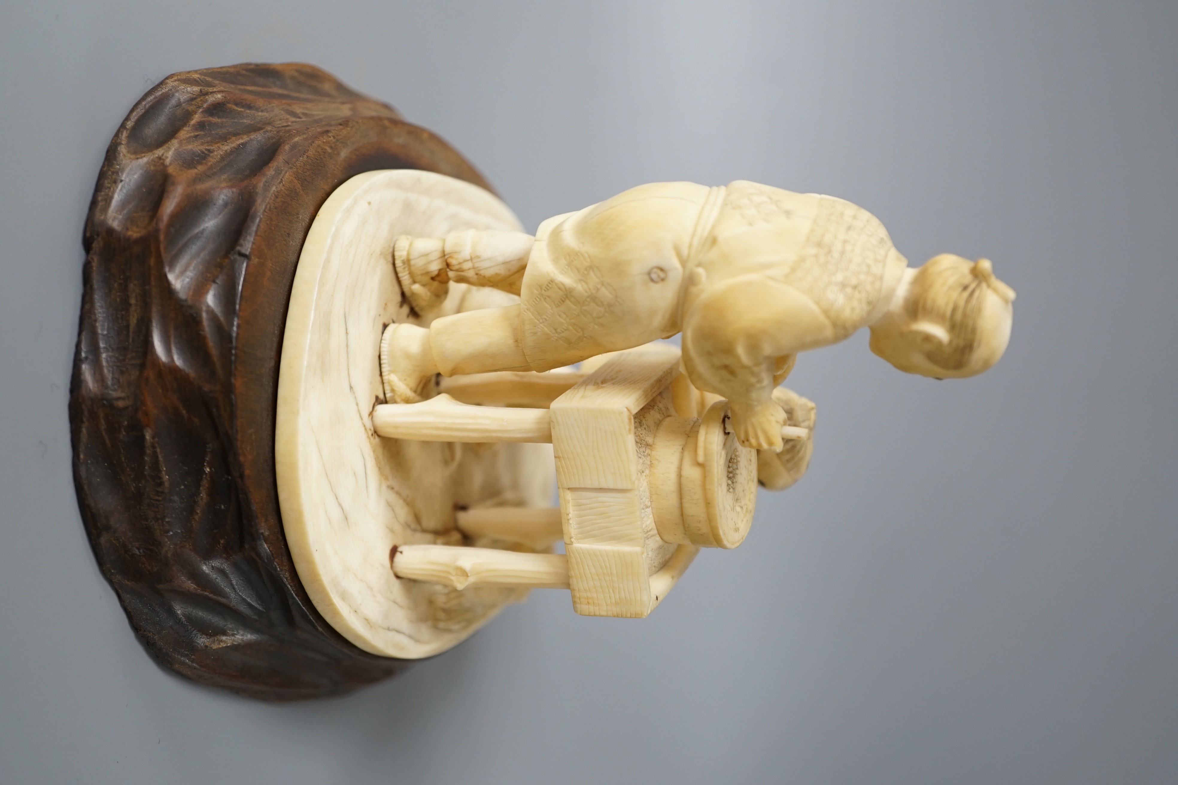 A Japanese ivory okimono of man and boy at a grindstone, Meiji period, signed, wood stand. 15cm - Image 4 of 6