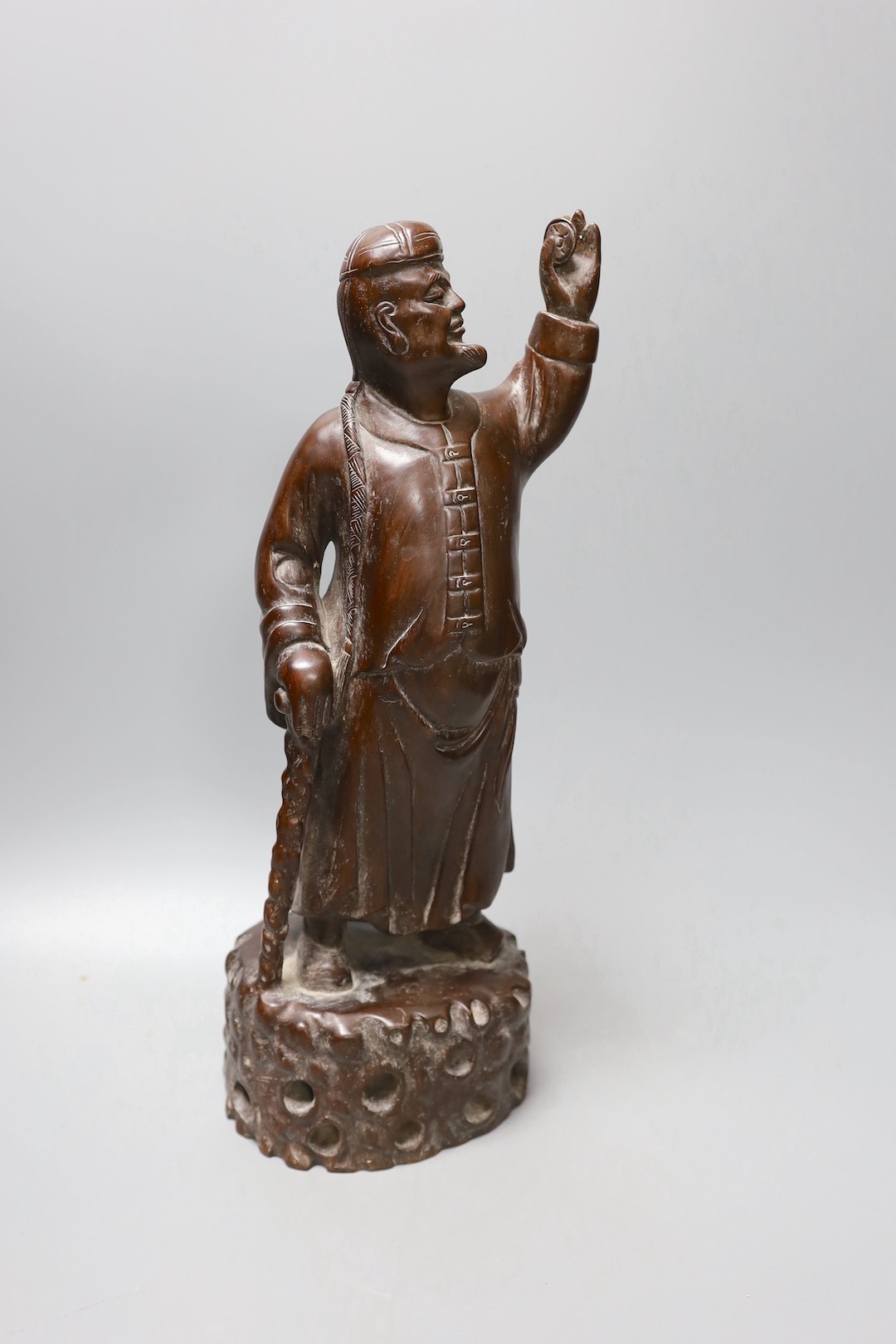 A Chinese carved hardwood figure of a sage 39.5cm