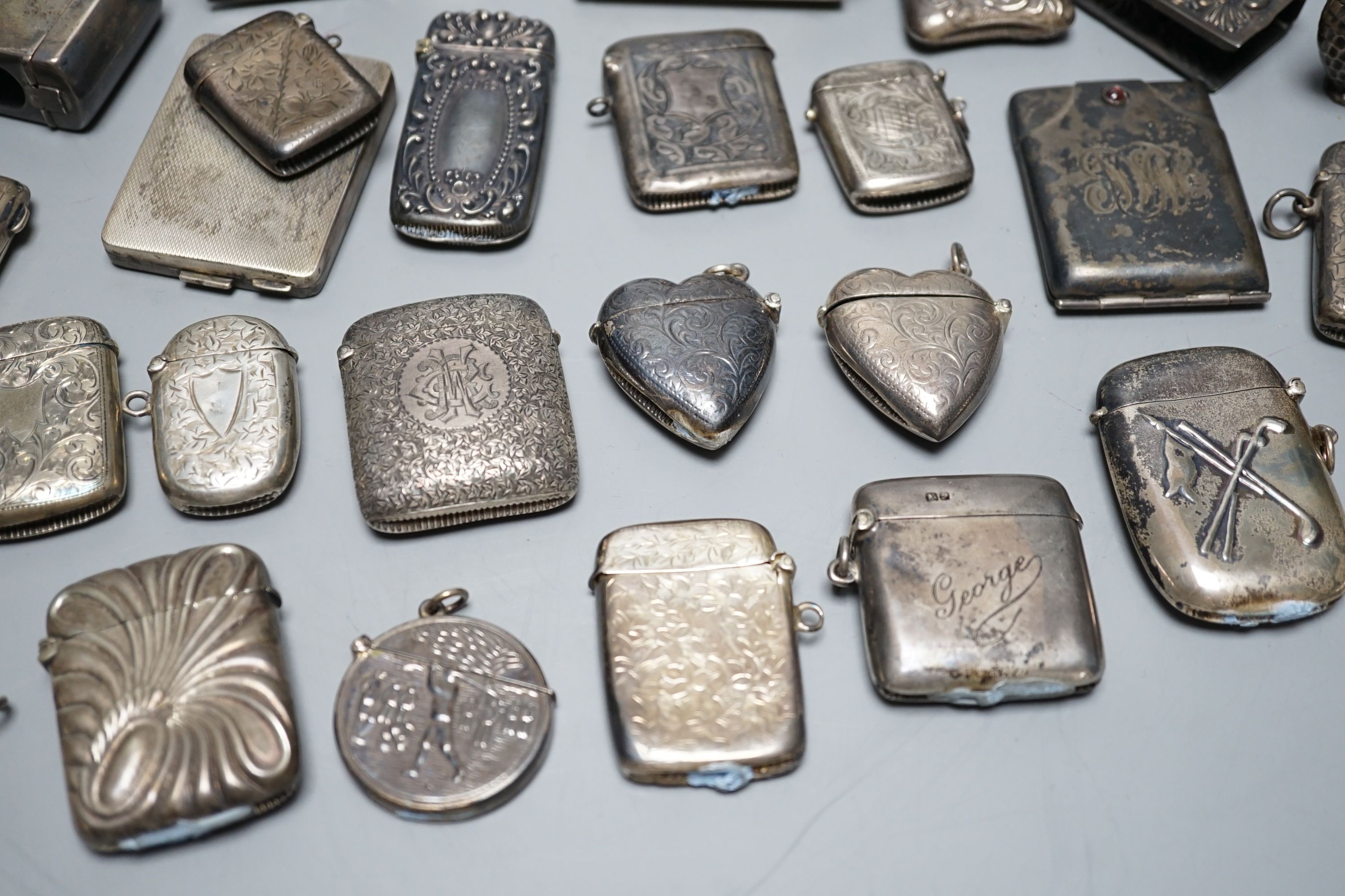 A collection of twenty six assorted mainly early 20th century silver or white metal vesta cases, - Image 6 of 8