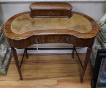 An Edwardian satinwood banded marquetry inlaid mahogany kidney shaped writing desk, width 89cm,
