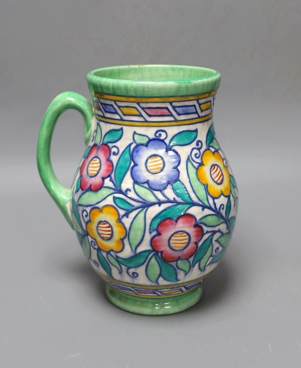 A Charlotte Rhead jug,22 cms high.