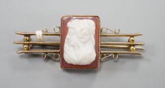 An early 20th century 9cy and sardonyx square cameo set bar brooch, carved with the bust of a lady