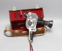 A vintage Bolex zoom reflex cine camera in original leather case