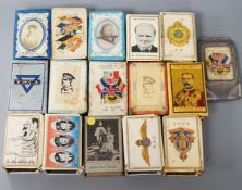 A collection of early and mid 20th century WWII match box holders