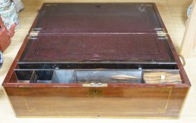 A brass inlaid mahogany writing slope, Coromandel covers to interior, 49cm wide