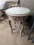 A pair of circular bleached oak occasional tables, stone inset tops, diameter 44cm, height 60cm