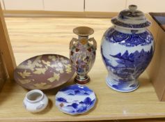 A large Chinese blue and white baluster jar and cover (a.f.) and four other Oriental items.