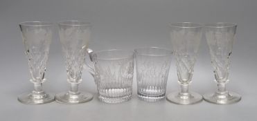 A set of four etched glass flutes, similar tumbler and mug,Flutes 25cms high.
