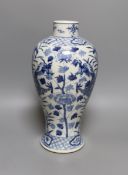 A Chinese blue and white ‘dragon’ vase. Kangxi mark but later, 31cm
