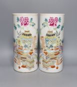 A pair of Chinese famille rose cylindrical vases 27cm