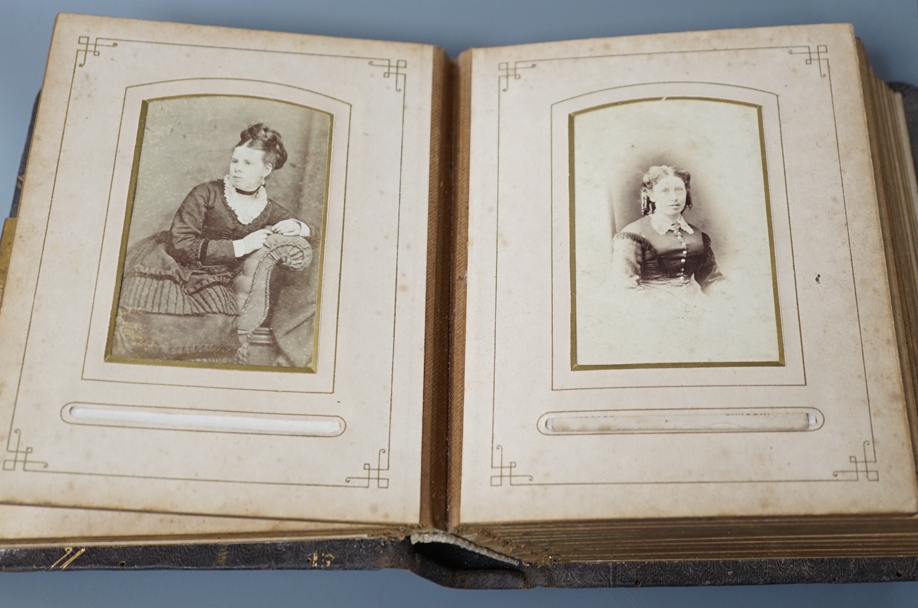 A Victorian portrait photograph album in clasp bound book containing cabinet cards - Image 2 of 4