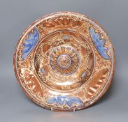 A Hispano-Moresque gold and blue wall plate, 37cm