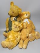 A 1930's bear in green dress, 58cm, with a synthetic European Bear, 40cm, and a synthetic european