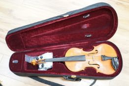 A cased viola by Robert Hull, label dated 1976, Hutton, Merseyside.Length 68 cms,