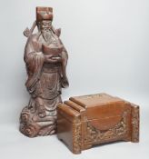 A Chinese carved wood sage and small carved trunk,Sage 47 cms high.