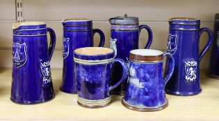 Four large Royal Doulton BSA Shooting Club jugs, 20cm, and two related mugs