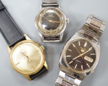 A gentleman's steel and gold plated Bucherer manual wind wrist watch, a steel Tissot watch and