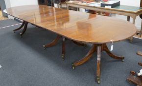 A George III and later mahogany three pillar D end extending dining table, one spare leaf, 376cm