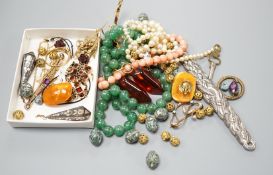 A group of assorted Victorian and later jewellery, including a gold and gem set ring, a pair of gilt
