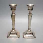 A modern pair of silver mounted candlesticks, JD Ltd, Birmingham, 2000, height 21.5cm, weighted.