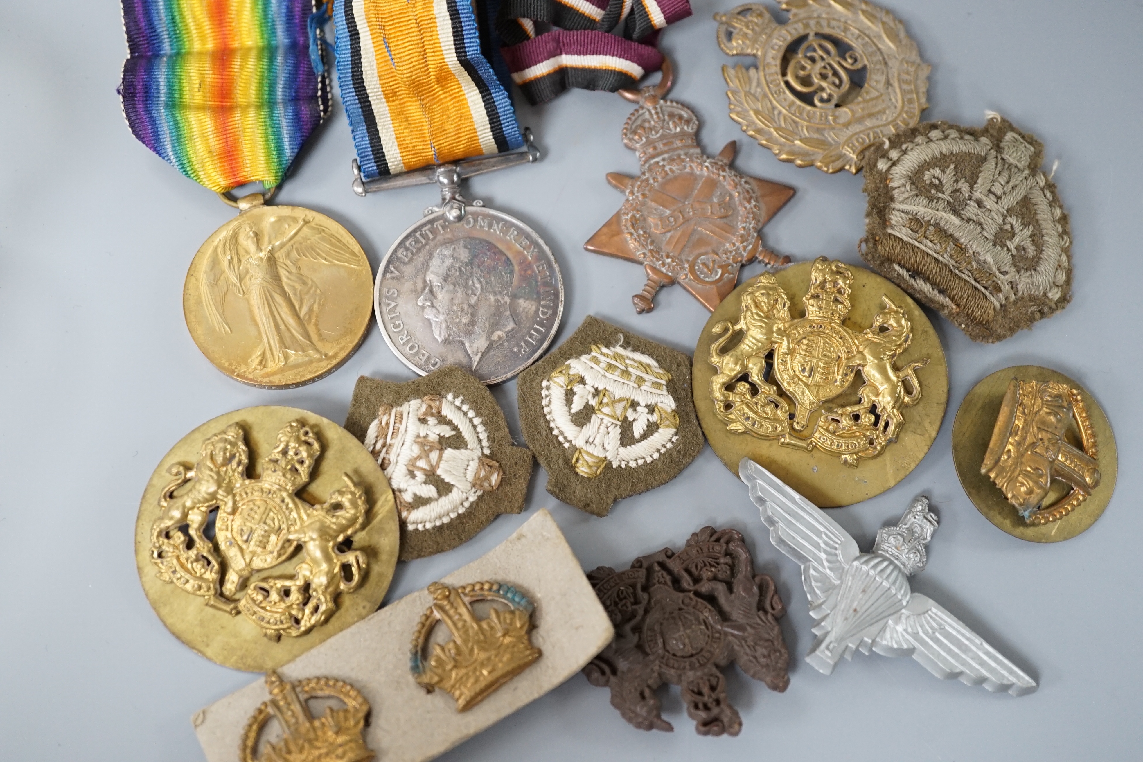 Two WWI medals, collection of cap badges and buttons, Queen Mary tobacco tin and a 66th Infantry - Image 3 of 6