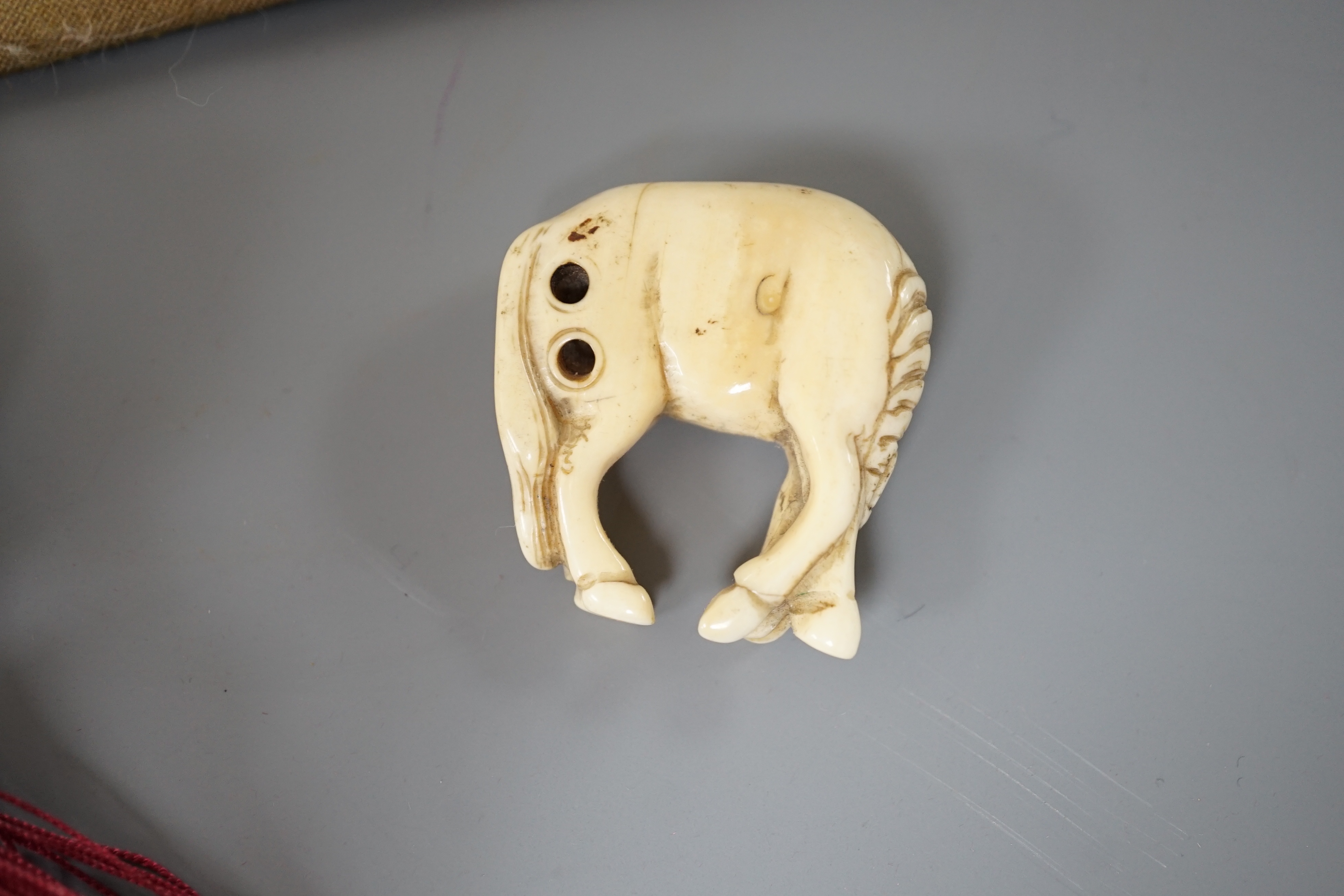 A 19th century Chinese pierced Ivory scent box together with a netsuke modelled as a horse and ivory - Image 7 of 7