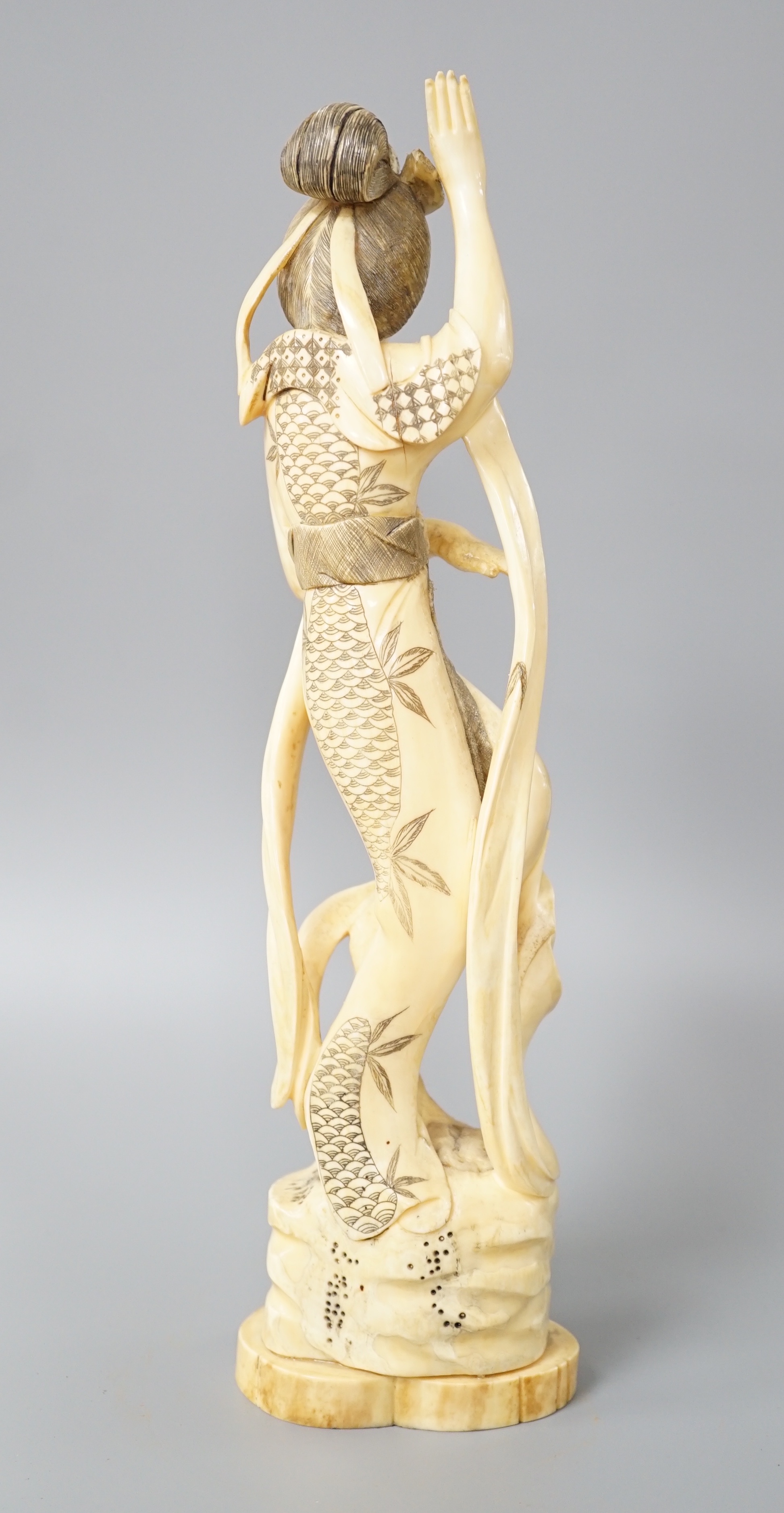 A Japanese walrus ivory figure of Seiobo, the Queen Mother of the West, early 20th century 28cm - Image 3 of 7