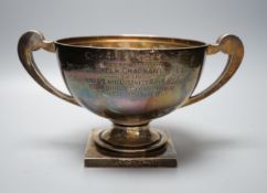 A George V silver two handled presentation trophy cup, with engraved inscription, William Neale Ltd,