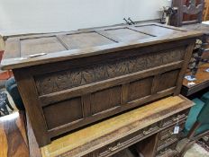 A reproduction oak coffer, length 120cm, depth 48cm, height 53cm