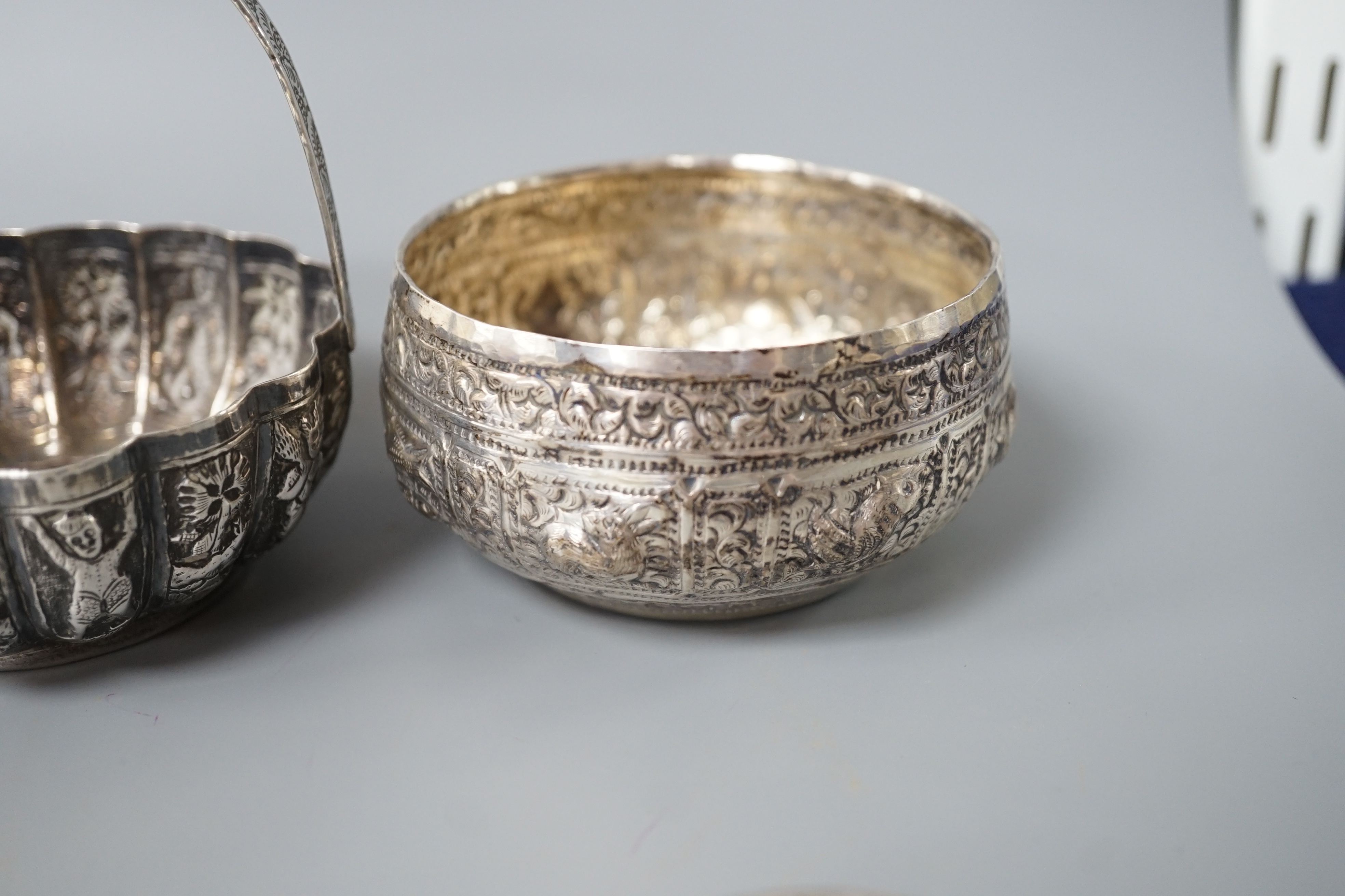 A Burmese? white metal bonbon basket, height 10.1cm and a similar bowl, two Persian white metal - Image 6 of 8