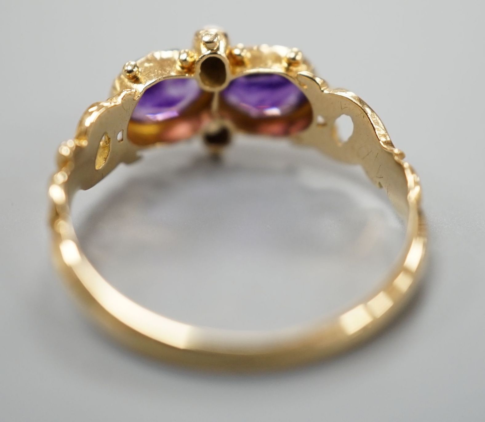 A late Victorian yellow metal, two stone amethyst and two stone seed pearl set cluster ring, size L, - Image 4 of 4