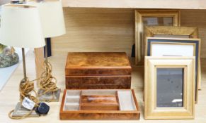 A burr walnut jewellery box, collection of gilt photo frames and a pair of table lamps