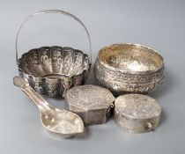 A Burmese? white metal bonbon basket, height 10.1cm and a similar bowl, two Persian white metal