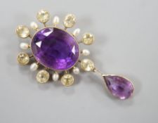 An early 20th century yellow metal, amethyst, olivine, and baroque pearl set drop pendant, 47mm,