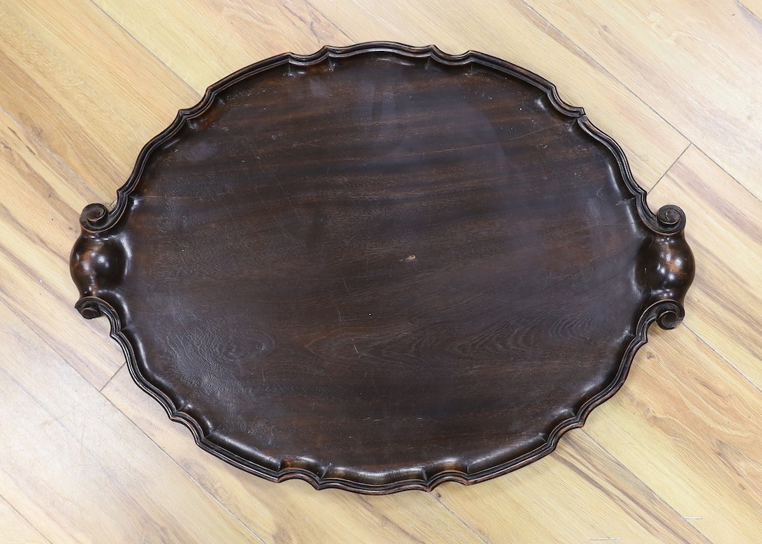 A 19th century carved oval mahogany tray, 67cm
