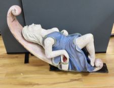 A painted wood and gesso female figurehead reclining - 74cm deep, 93cm high