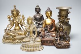A group of five Tibetan or buddhist bronzes of deities and a Chinese bronze ‘dragon’ vase, tallest