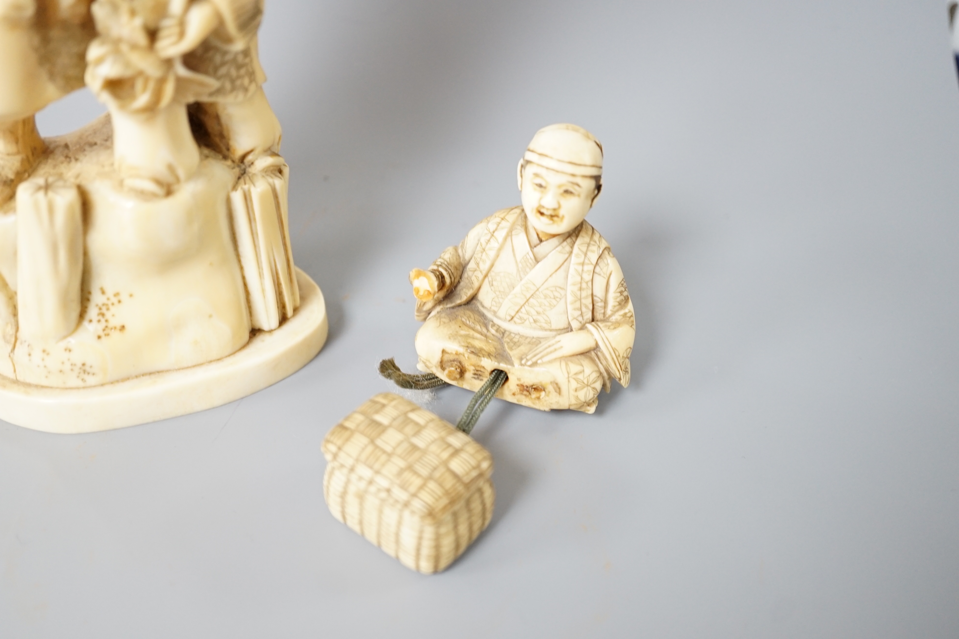 A 19th century Japanese marine ivory okimono of a bearded man and child together with a similar - Image 2 of 8